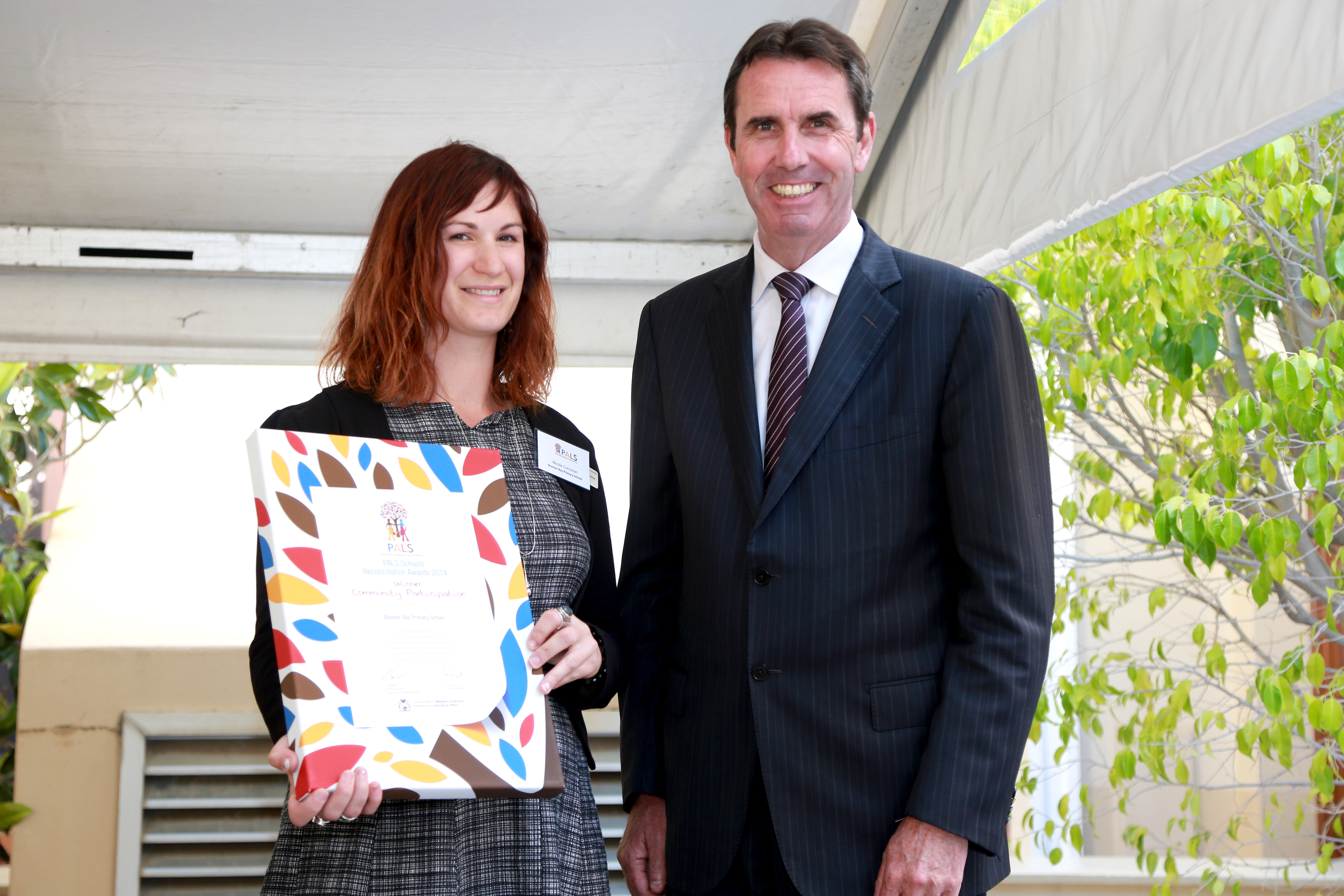 Substantive Principal, Nicole Corcoran, receiving a State PALS Award for Community Participation from former Education and Training Minister, Peter Collier