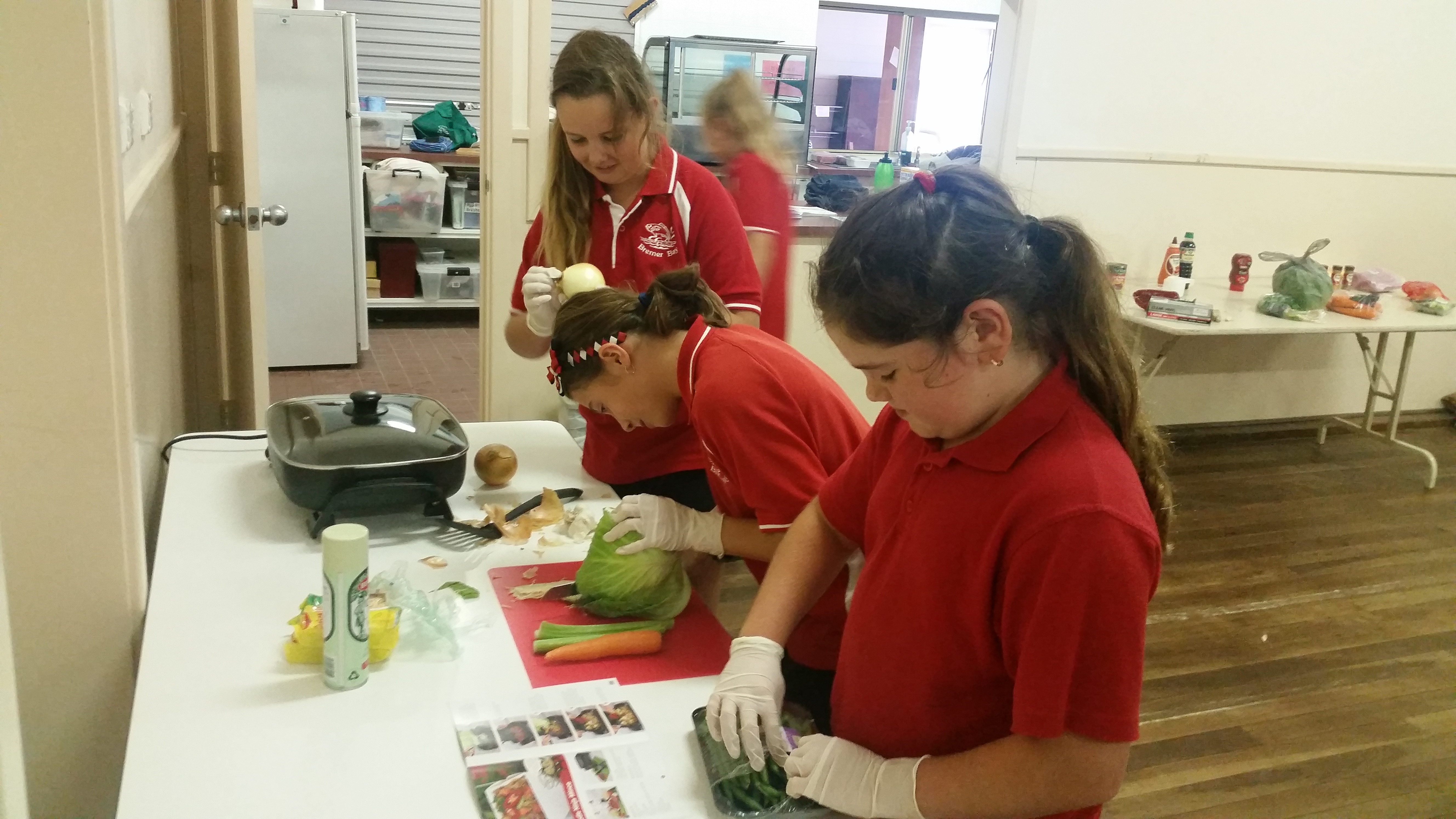 Students learning to cook a wide range of healthy recipes at our local Community Resource Center.